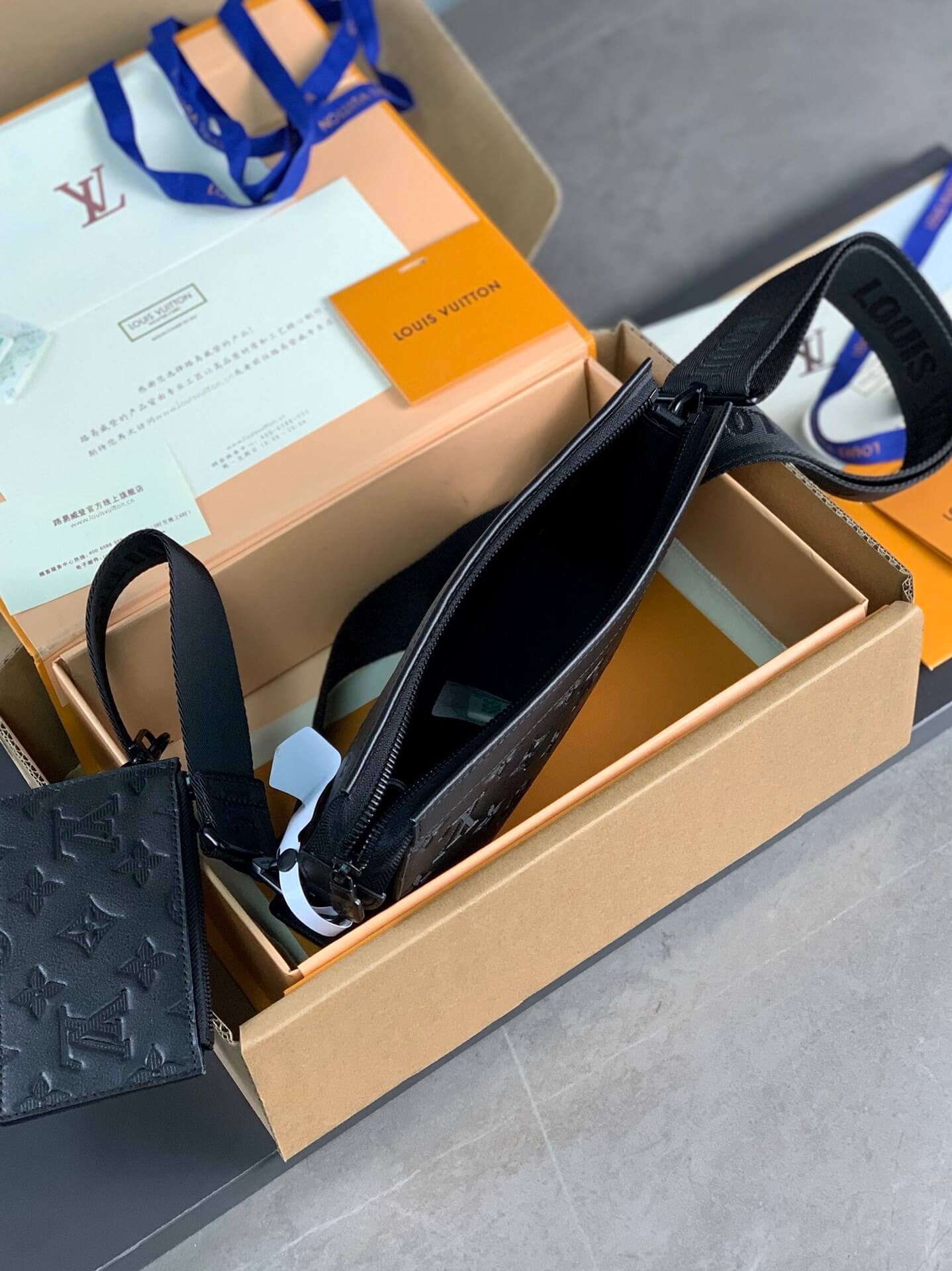 LV Alpha Wearable Wallet combines Monogram Eclipse canvas