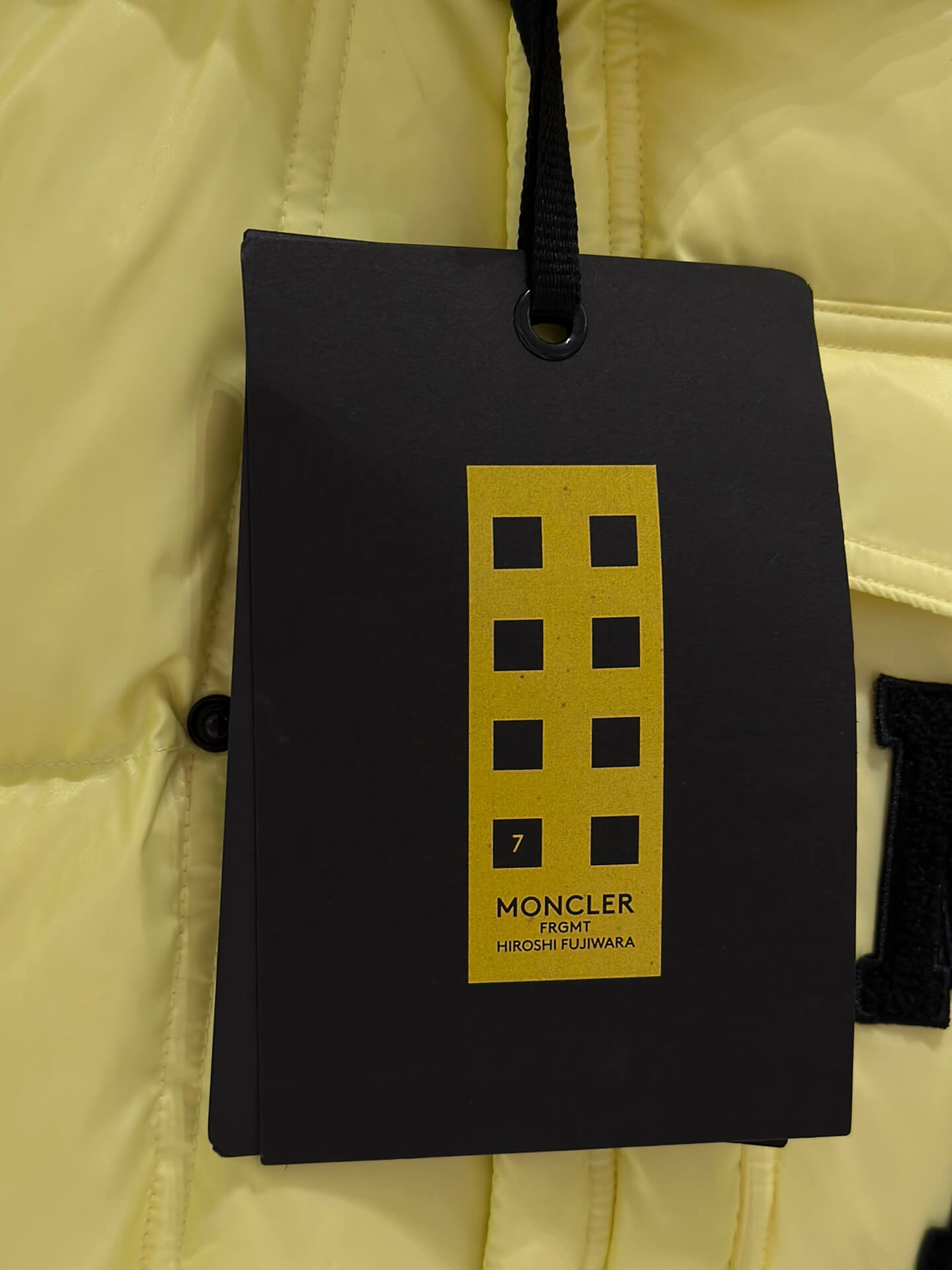 Moncler Yellow Hanging Jacket: Latest Fashion Trends