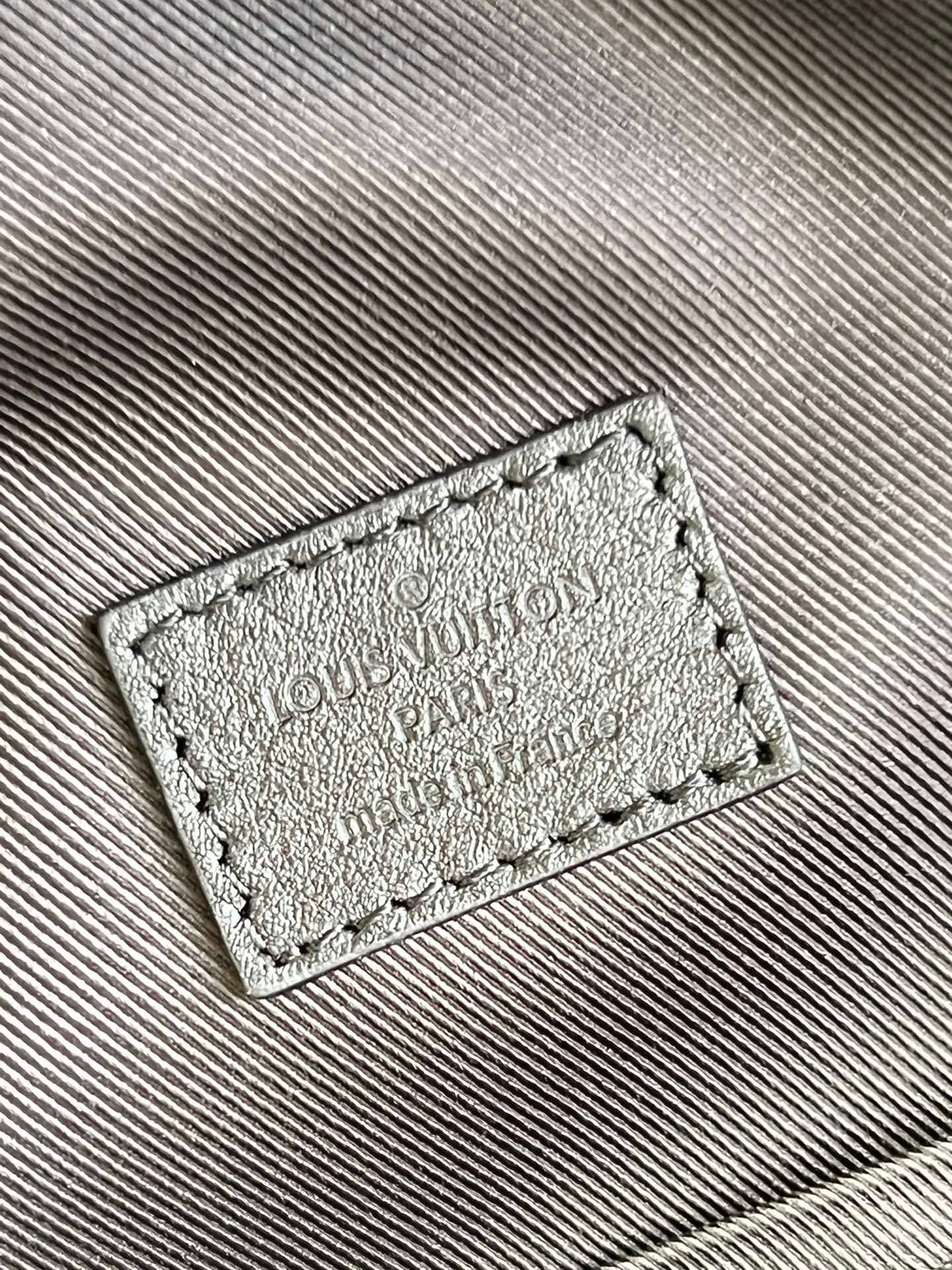 LV Racer Sling Bag